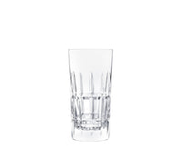 A Saint-Louis Manhattan Barware highball glass with a faceted cut-crystal design stands upright empty on a plain white background.