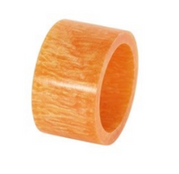 The Bodrum Marble Band Napkin Ring Set of 4 features wide, cylindrical napkin rings in vibrant orange resin with a smooth, marbled pattern—ideal for adding a colorful accent to your table decor.