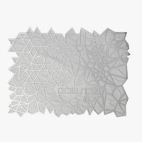 The Geometric Challah Cover by Apeloig is a modern white cover with an abstract pattern of polygons and triangles, featuring Hebrew text on the lower right.