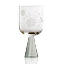 The Peony Goblet Set of 2 by Current Home features clear glass with a frosted floral pattern and a tapered stem, adding handcrafted elegance and charm to any collection.