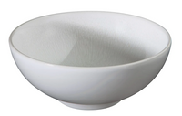 A simple white ceramic bowl with a smooth finish, shown at an angle against a white background, highlights the handmade durability of Jars - Rosenthal Tourron Dinnerware Neige, crafted in France.
