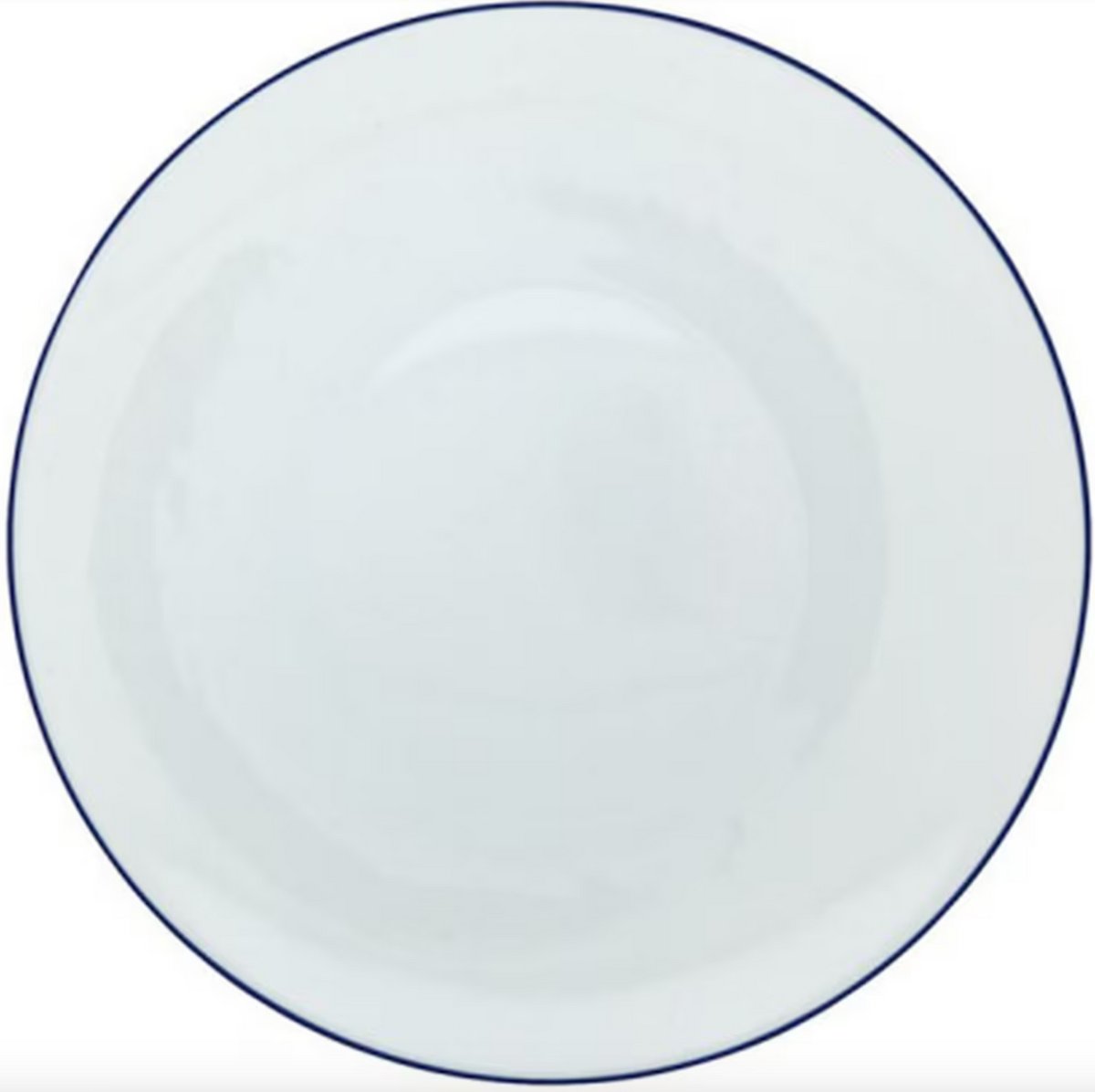 The Monceau Bleu Outremer Dinnerware by Raynaud features a plain, round white Limoges porcelain plate with a thin ultramarine blue rim, photographed from above against a white background.