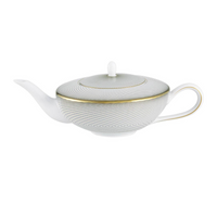The Oskar Dinnerware teapot by Raynaud is crafted from white Limoges porcelain, featuring fine geometric diagonal lines, a gold-accented curved spout and handle, and a gold-rimmed lid.
