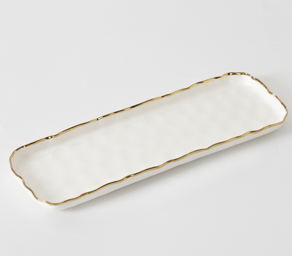 The PAMPA BAY Portofino Rectangle Tray is a white porcelain serving tray with a wavy gold-trimmed rim, shown on a plain white background.