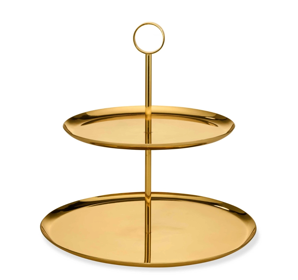 The Sinta 2 Tier Stand by Aerin features shiny, circular brass plates and a round handle, perfect for serving or displaying food in authentic Mid-Century Modern style.