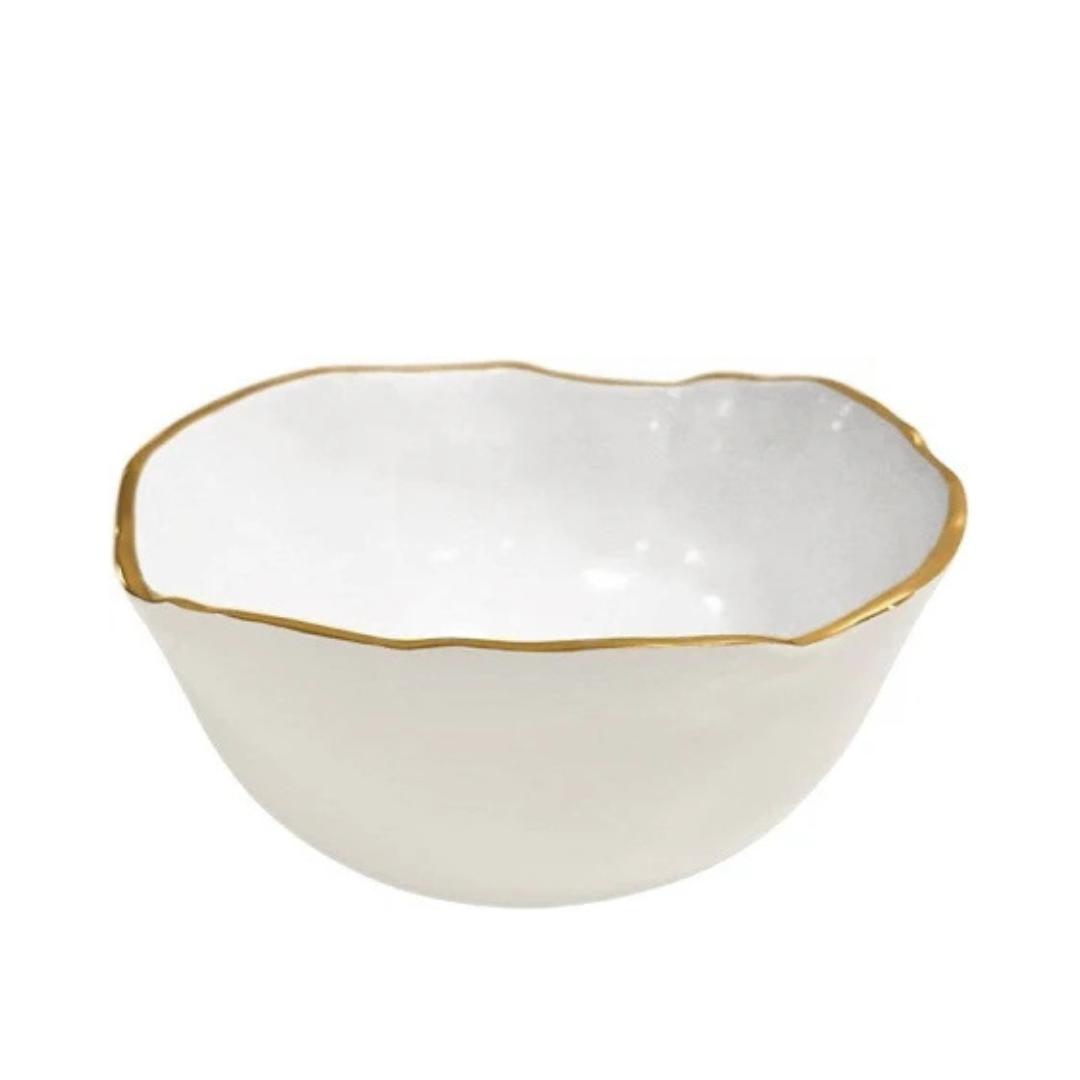 The Beatriz Ball Encanto Osaka Bowl Cream & White - Large is a white ceramic serving bowl with an uneven wavy rim and thin gold edge, featuring a simple, modern design.