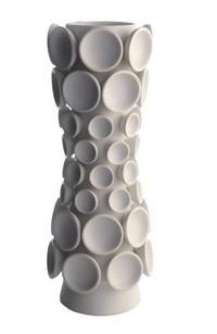 The Cumulus Collection Alabaster by KleinReid is a tall, white handcrafted vase featuring a narrow waist and raised circular discs of various sizes across its surface against a plain white background.
