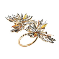 The Butterflies Napkin Ring Set of 4 by Kim Seybert features layered, gold-tone butterfly designs embellished with sparkling crystals and rhinestones for an elegant, eye-catching table accent.