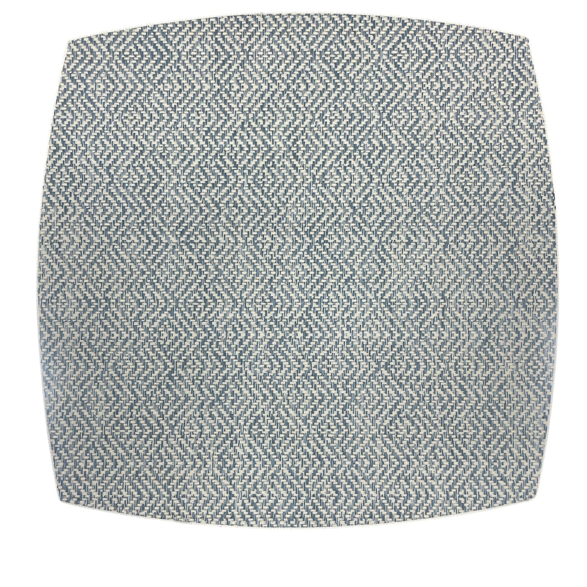 A square ceramic plate with blue and white herringbone pattern pairs beautifully with Julian Mejia’s Ellipse Reversible Placemat Set of 4 in Azure Eggshell.