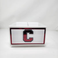 The Eye Candy College Spinner, a white rectangular organizer featuring a bold black and red letter C college logo, stands out on any desk and makes a stylish organization solution.