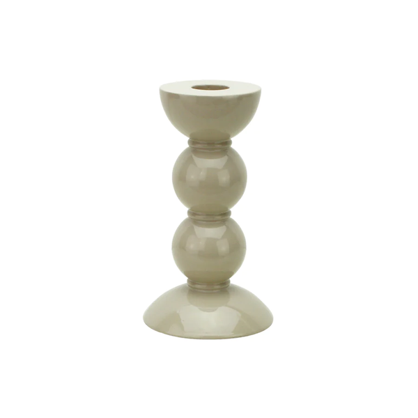 The Addison Ross Bobbin Cappuccino Candlestick features a glossy beige ceramic finish, a stacked spherical design, and a wide, rounded base, shown against a plain white background.