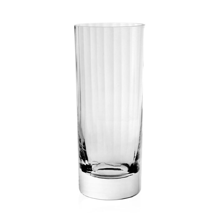 The Corinne Drinkware by William Yeoward is an empty glass tumbler with vertical ridges, standing upright on a white background, featuring contemporary barware style and an optic effect glass design.