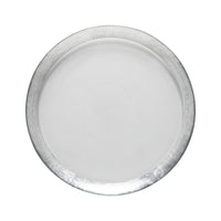 A round, empty white plate with a shiny silver rim, viewed from above against a white background—an elegant companion to Casafina’s Camille Glass Charger Silver.