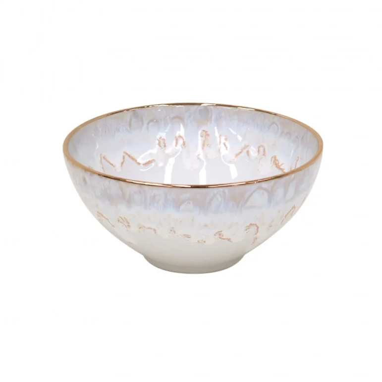 The Taormina Dinnerware White & Gold bowl by Casafina/Costa Nova features a glossy white and light blue marbled design with a hand-painted 18-karat gold rim and decorative gold accents, crafted in Portugal.