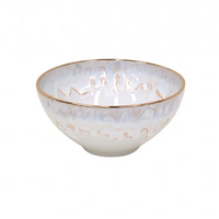 The Taormina Dinnerware White & Gold bowl by Casafina/Costa Nova features a glossy white and light blue marbled design with a hand-painted 18-karat gold rim and decorative gold accents, crafted in Portugal.
