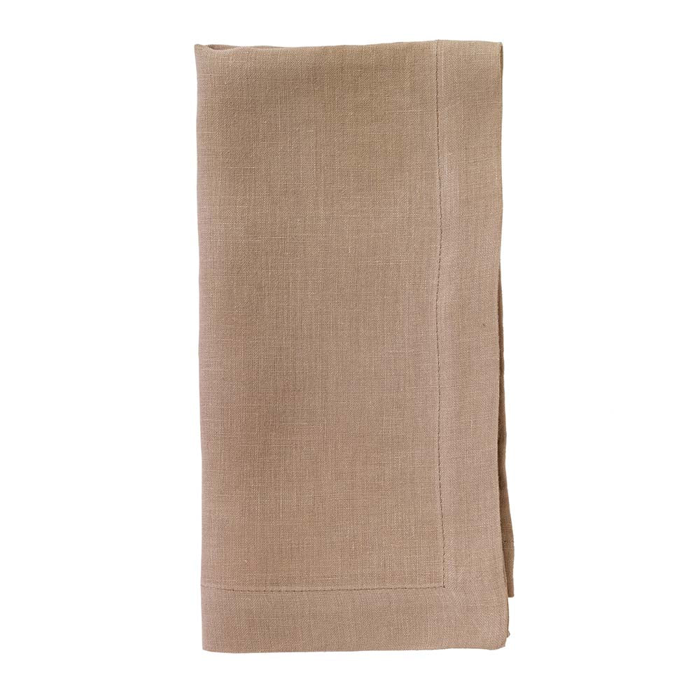 The Bodrum Riviera Napkin Set of 4 is displayed, featuring neatly folded light brown, stone-washed linen napkins against a white background.