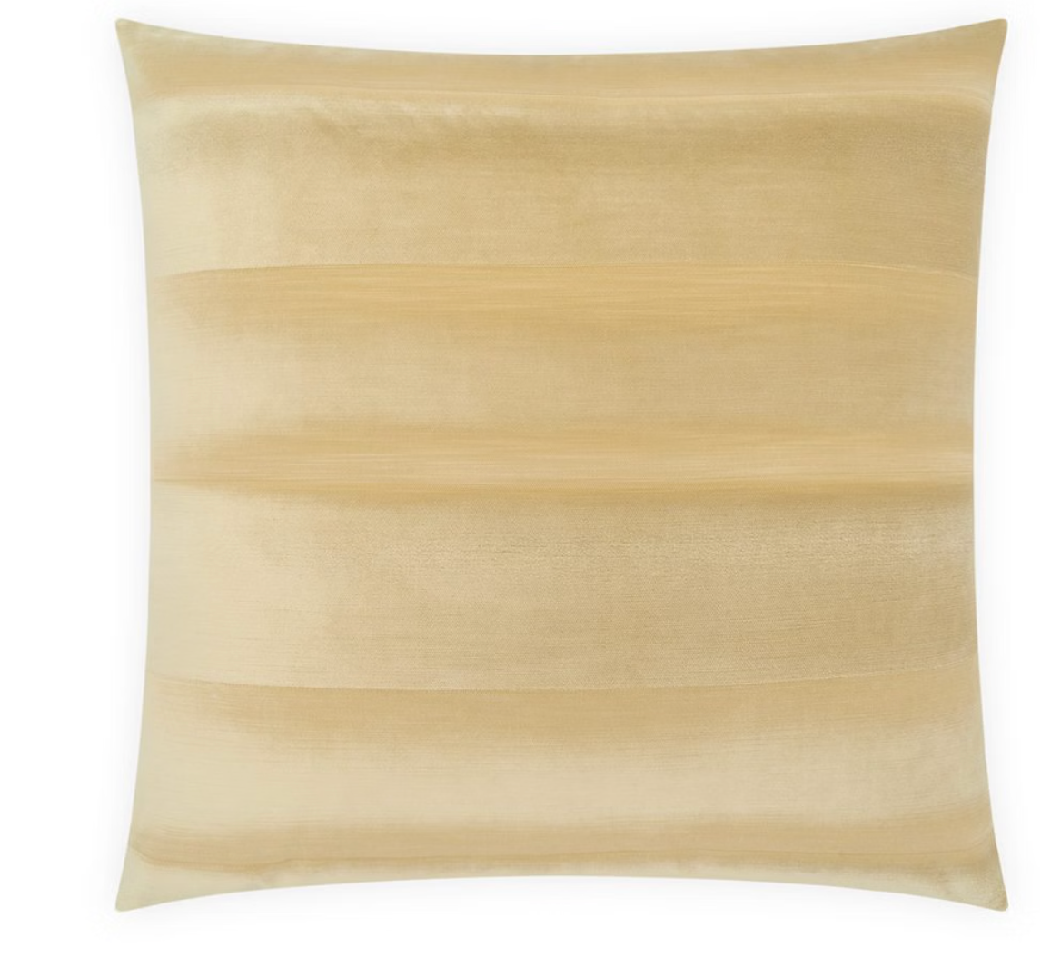 Square Lumiere Pillow Desert in a solid light tan color with subtle horizontal banding, offering a desert-inspired aesthetic.