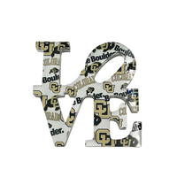 The Eye Candy College Love Sculpture is a decorative sign shaped as "LOVE" with University of Colorado Boulder logos in black, gold, and white—an ideal graduation gift or school collectible for any CU fan.