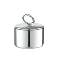 The Christofle Vertigo Silver Plated Sugar Bowl features a shiny, cylindrical design with a smooth surface and a round, looped handle, shown against a white background.