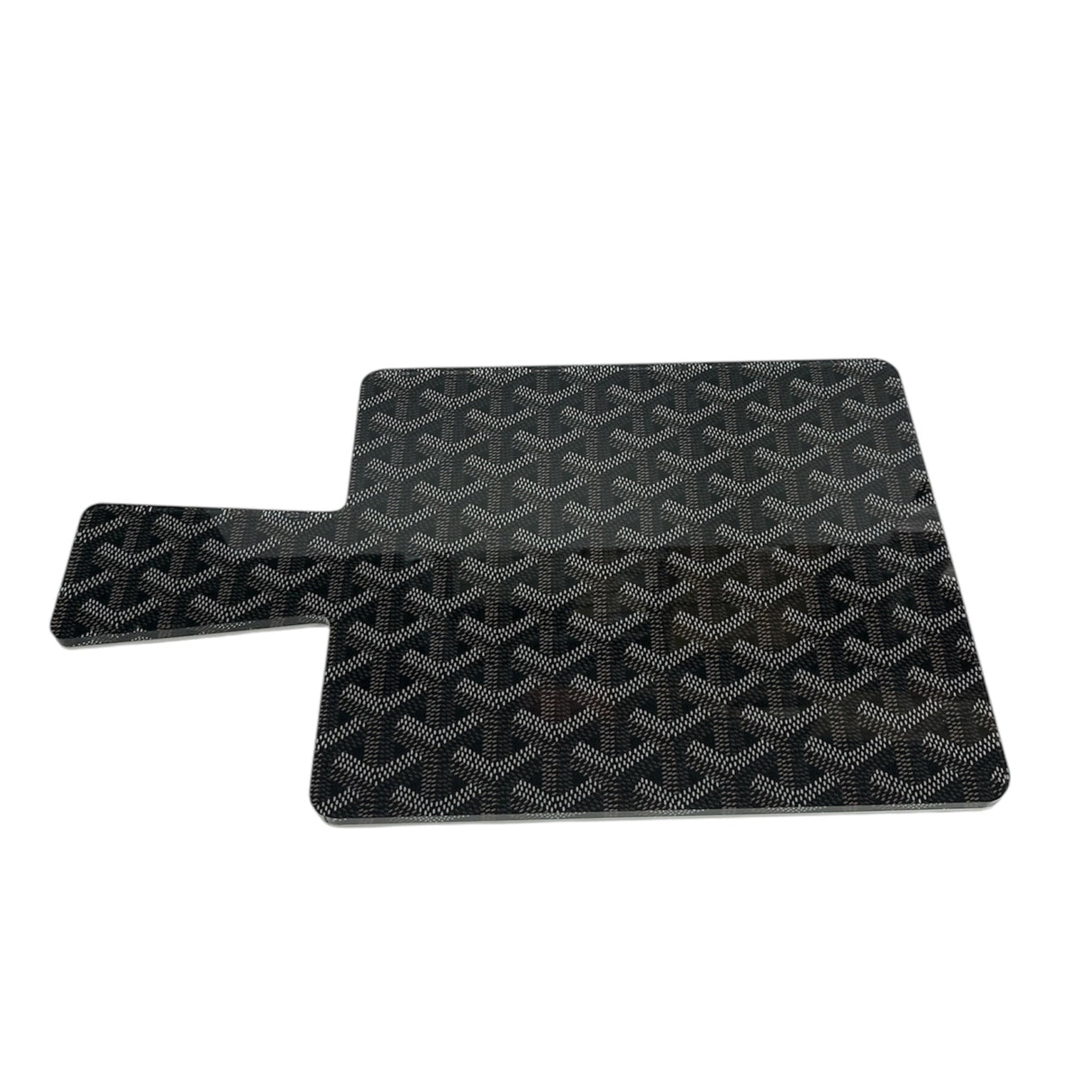 The Eye Candy Maison Charcuterie Board Paddle - Black is a rectangular black acrylic board with a left-side handle and a white dot geometric pattern—ideal as stylish serveware or a modern charcuterie board.