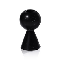 The Kym Black Candle Holders by Zodax feature a modern, geometric design with a spherical top and conical base in glossy black, shown against a white background for striking contrast.