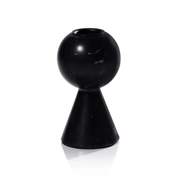 The Kym Black Candle Holders by Zodax feature a modern, geometric design with a spherical top and conical base in glossy black, shown against a white background for striking contrast.