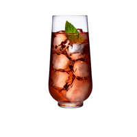 A Hepburn Glass from the Nude Glassware Hepburn Glass Set of 4, filled with a dark red iced drink and fresh mint garnish, stands out against a white background. The lead-free crystal beautifully highlights the drink and ice cubes.