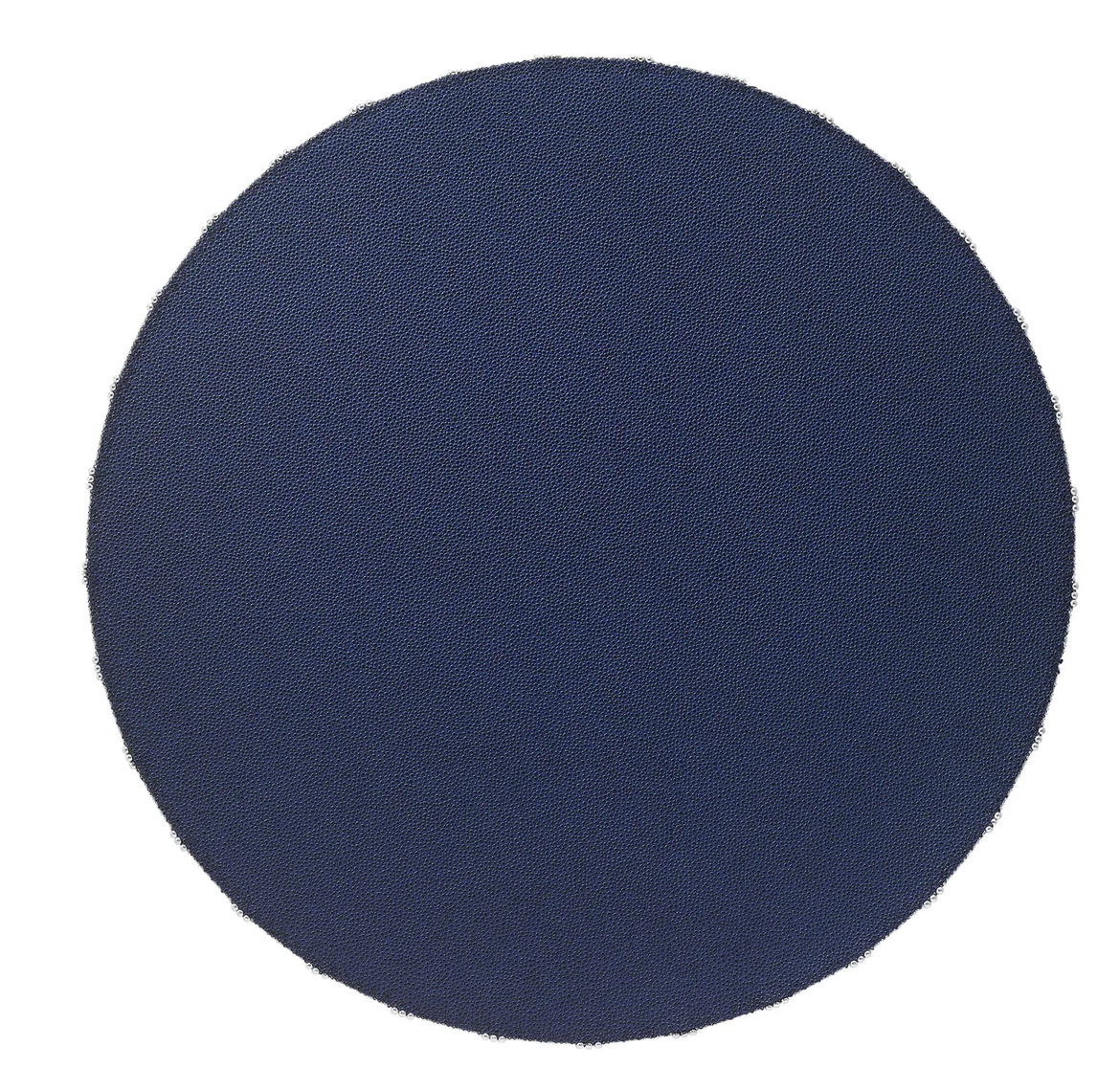A round, navy blue Charm Placemat Navy with a textured, beaded surface crafted from phthalate-free vinyl.
