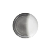 The La Cotera Melamine Dinnerware Gray by Fortessa is a round plate featuring a gradient from dark gray to white, shown on a white background—ideal for those seeking durable, dishwasher-safe dinnerware.