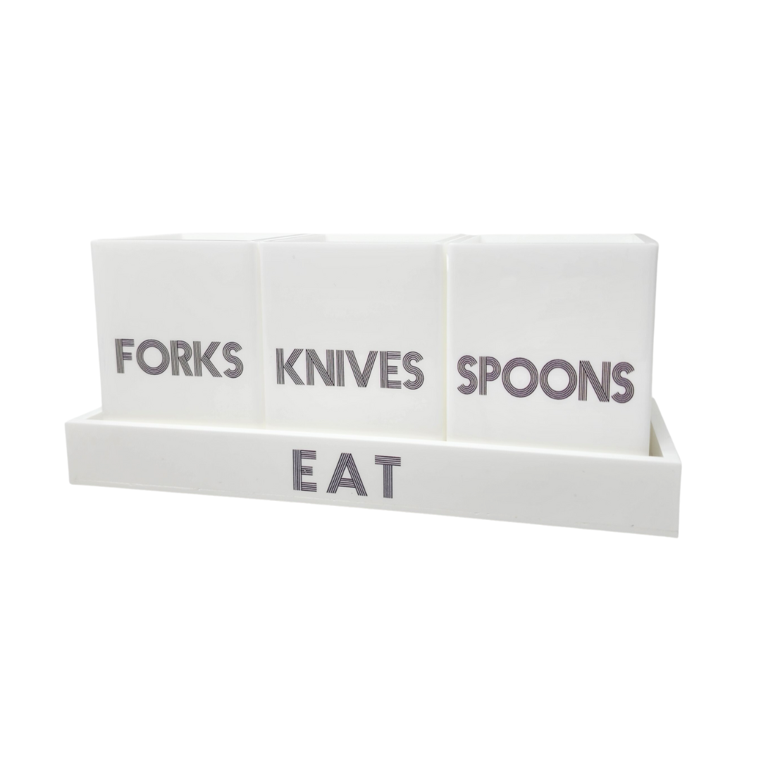 The Eye Candy Let's Eat Silverware Caddy in white with dark grey keeps your forks, knives, and spoons organized and accessible in labeled containers on a stylish matching tray for any countertop or table.