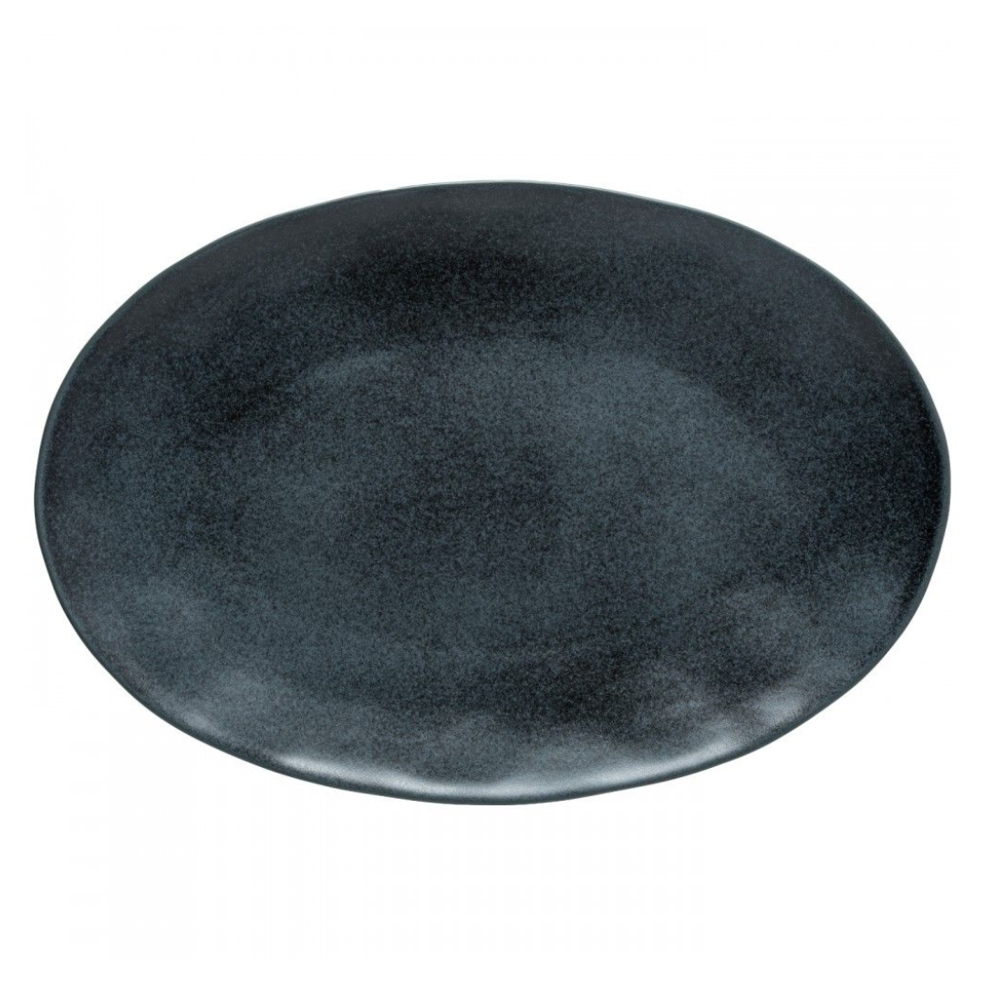 A large, oval, matte black ceramic plate with a slightly uneven rim from the Livia Dinnerware collection by Casafina/Costa Nova, viewed from above on a white background.