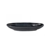 The Livia Dinnerware Matte Black by Casafina/Costa Nova is an oval ceramic plate with a matte finish and gently raised rim, shown against a plain white background as part of a modern tableware collection.