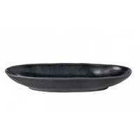 A shallow, round Livia Dinnerware Matte Black ceramic plate by Casafina/Costa Nova features a smooth, slightly textured surface as part of a modern collection, viewed from the side against a white background.