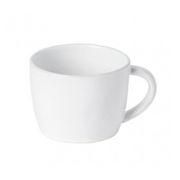 The Livia Dinnerware White mug by Casafina/Costa Nova, featuring a curved handle, is displayed against a white background—ideal for enhancing your modern tableware collection.