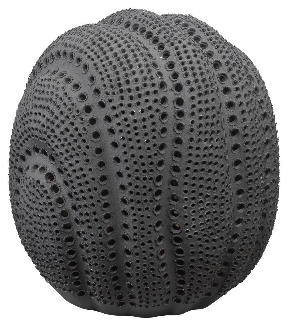 The Solar Sphere - Black by Jamie Young is a round porcelain vase with a textured, sea urchin–inspired surface of small holes and raised bumps, creating a striking decorative piece.