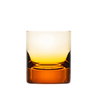 The Moser Whiskey Set DOF Glass 370 ml features lead-free crystal with a gradient effect, blending amber at the base to yellow and clear at the top, shown against a white background.