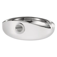 The Christofle Oh De Stainless Large Steel Bowl features a sleek, modern oval design with a side circular drain hole, inspired by the Christofle Outdoor Collection and shown on a plain white background.