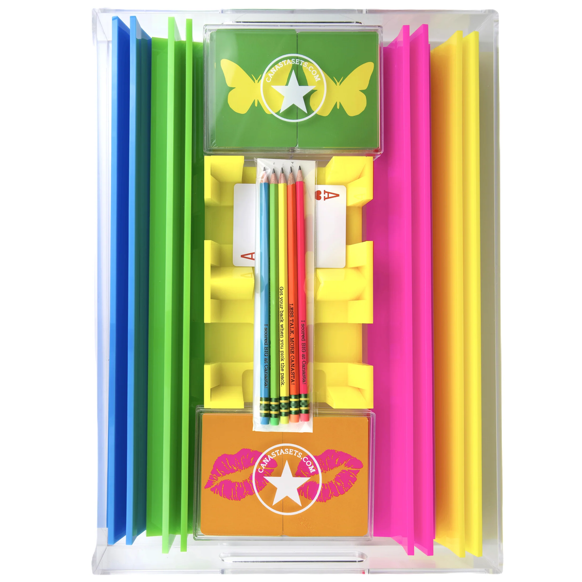A clear tray displays customizable colorful folders and two boxes with green and orange butterfly and lips lids. Included are rainbow pencils, card racks, and the Canasta Sets Canasta Gift Starter Set - Multi.