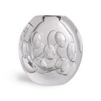Introducing the Whitney Vase by FlowDecor Inc.—a contemporary clear glass vase distinguished by its spherical shape and round, indented bubble-like patterns on the surface. With a smooth, reflective finish, this decorative accent adds modern elegance to any space and is showcased against a plain white background.