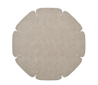 A grey, textured, octagonal fabric piece with rounded corners and small notches along the edges, this contemporary placemat—part of the Divot Placemat Set of 4 by Kim Seybert—is displayed flat against a white background and makes a versatile addition to any collection of dining room accessories.