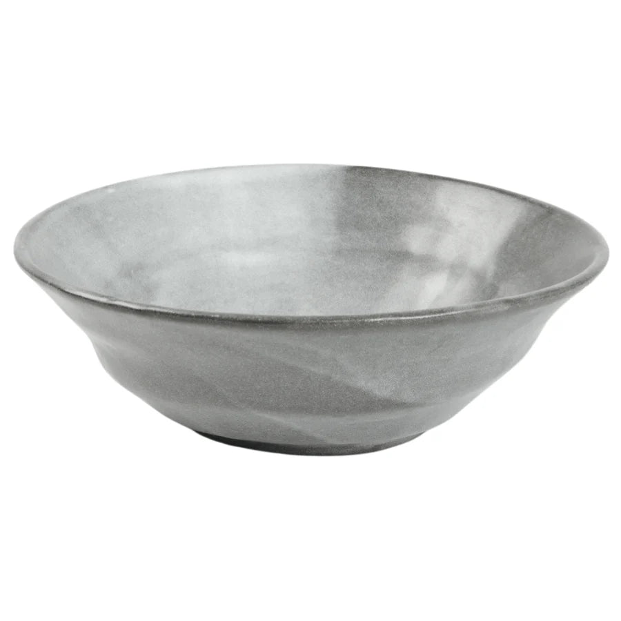 The Marcus Cement Dinnerware Set of 4 by Blue Pheasant features grey, textured ceramic bowls with a ripple pattern. Both stylish and dishwasher safe, these organic pieces are perfect for everyday use.