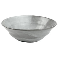 The Marcus Cement Dinnerware Set of 4 by Blue Pheasant features grey, textured ceramic bowls with a ripple pattern. Both stylish and dishwasher safe, these organic pieces are perfect for everyday use.