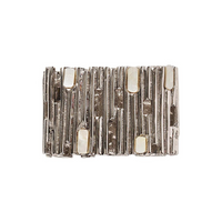 A rectangular, gold-toned napkin ring from the Matrix Napkin Ring Set of 4 by Kim Seybert, featuring an abstract, textured vertical line design adorned with small rectangular white inlays—evoking the luminous accents reminiscent of mother-of-pearl.