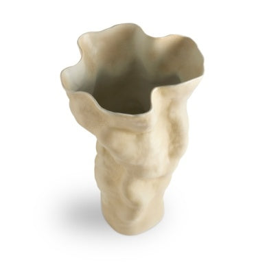The Timna Vase Latte - Tall by L'Objet is a beige ceramic vase with an organic, sculptural shape inspired by Arava desert porcelain, featuring an irregular wavy rim and smooth yet uneven surface. Shown upright on a white background.