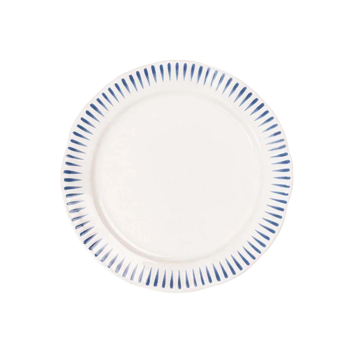 The Juliska Sitio Stripe Dinnerware is a round white plate featuring evenly spaced blue stripes radiating from the rim, inspired by Delft blue artistry and finished with a classic whitewash glaze.