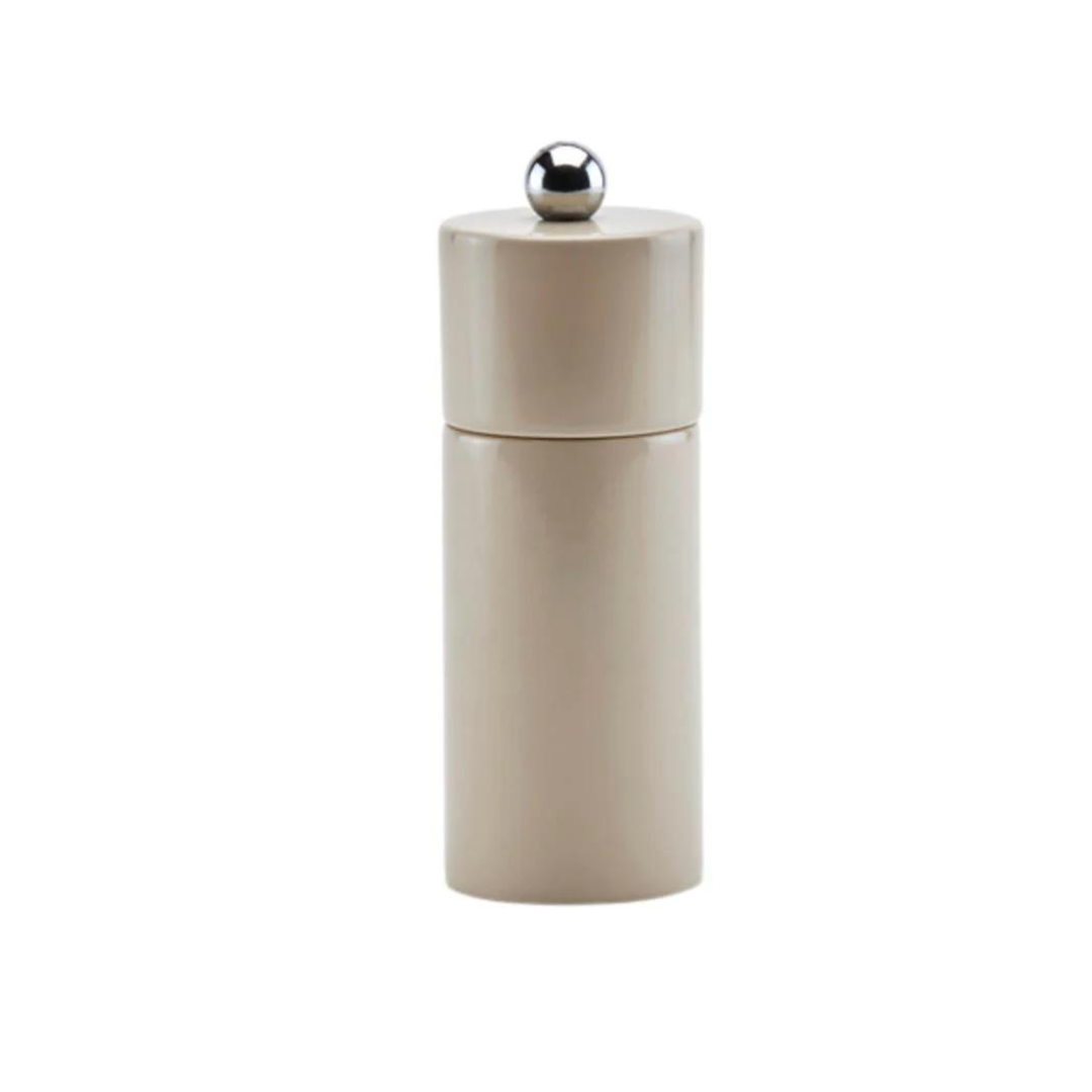 The Addison Ross Mini Pillar Salt & Pepper Shaker features a beige, cylindrical design with a smooth finish, metallic round top knob, and durable ceramic grinder, displayed against a plain white background.