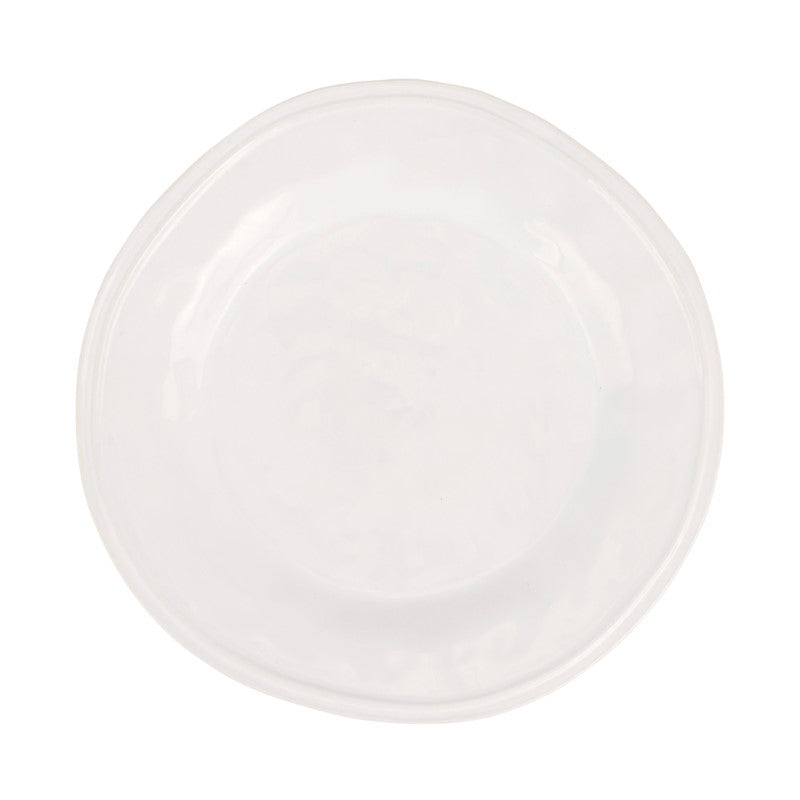 The Aria Dinnerware dinner plate by Vietri, crafted from white stoneware with a slightly irregular rim, is displayed from a top-down view against a white background.