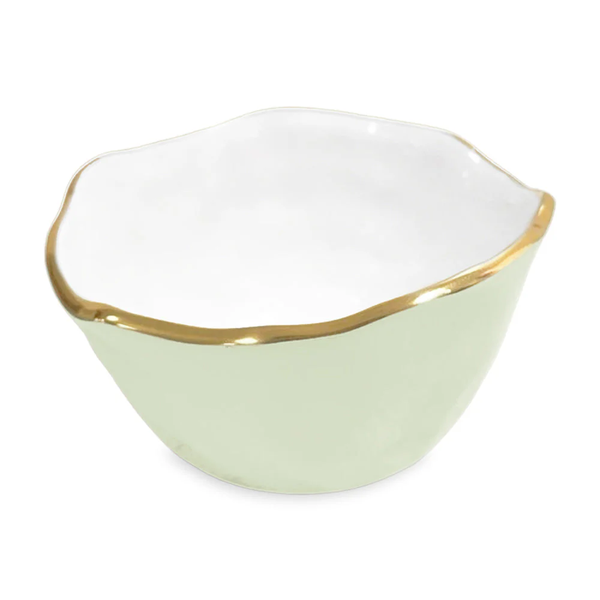 The Encanto Osaka Bowl Small by Beatriz Ball is a pale green bowl with a wavy gold-edged rim and smooth white interior—ideal as a decorative snack bowl for any setting.