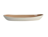 The Maguelone Dinnerware Tamaris shallow oval ceramic serving bowl by Jars - Rosenthal features a white exterior, light brown interior, and is photographed against a plain white background.