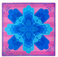 Oh My Mahjong’s "Mahjong Mats" square scarf features a symmetrical blue design with stylized eyes and hands on a pink background, inspired by Mahjong Mats, with CHARLESTON, JOKERS, DRAGONS, and decorative borders on the edges.